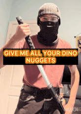 a man holding a sword with the words " give me all your dino nuggets " behind him