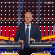Tapping Table Gerry Dee GIF - Tapping Table Gerry Dee Family Feud Canada GIFs