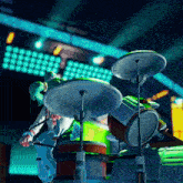 a cartoon character is playing drums and a keyboard is behind her