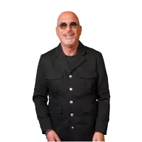 a man wearing sunglasses and a black jacket is laughing