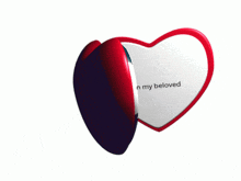 a heart shaped mirror with a picture of a man smoking a cigarette and the words john my beloved on it