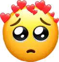 a sad emoji with red hearts on its head .