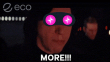 a man wearing a mask with pink stars on his eyes screams more
