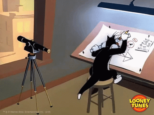 Gif - Sylvester the cat is busy planning his next attack in Tweety Bird!