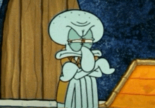 squidward from spongebob squarepants has his arms crossed and his tongue sticking out