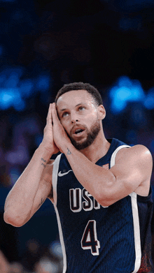 a basketball player wearing a jersey that says usa on it