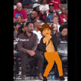 a man in a cowboy hat sits in the stands at a basketball game with a viggle.ai logo on his shirt