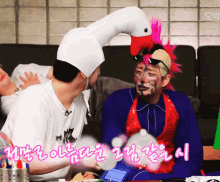 a man with a flamingo on his head is talking to another man with a mohawk