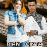 a man and a woman are standing next to each other with the name rian cinta written on the bottom