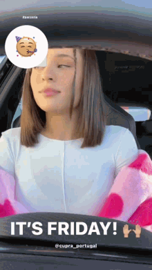 a girl sitting in a car with the words it 's friday