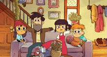 a family is sitting on a couch in a living room