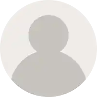 a gray circle with a silhouette of a person inside of it