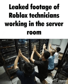 a group of men giving each other a high five in front of a server room