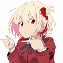 a girl in a red jacket is pointing her finger