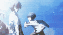 a man and a boy are standing next to each other in front of a blue sky