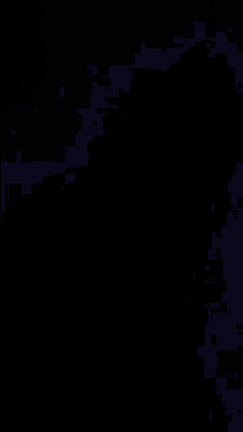 a purple background with a few spots of light