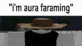 a cartoon character wearing a straw hat with the words " i 'm aura faraming " below it
