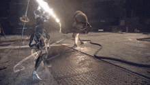 a video game character is fighting a monster in a dark room .