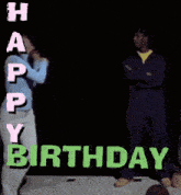 a woman is jumping in the air in front of a happy birthday sign
