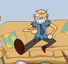 a man in a blue shirt and tie is jumping on a couch with his arms outstretched