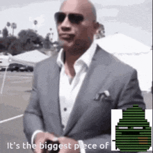a man in a suit and sunglasses says it 's the biggest piece of .