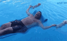 Puppies Pool GIF - Puppies Pool Floating GIFs