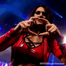 Heart Sign The Temptress GIF - Heart Sign The Temptress Wow Women Of Wrestling GIFs