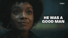 a woman is smiling with the words he was a good man below her