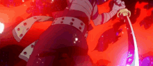 a person is holding a sword in their hand in a red and purple background .