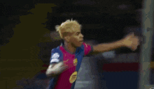 a blurry picture of a soccer game with a red flag in the foreground .