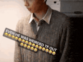 a man in a sweater has a sticker that says even he was weirded tf out on it