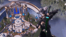 an aerial view of a very large building with a blue light shining on it