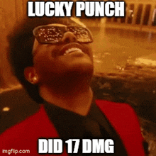 a man wearing sunglasses and a red jacket says lucky punch
