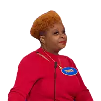 a woman in a red shirt has a name tag that says tonya on it