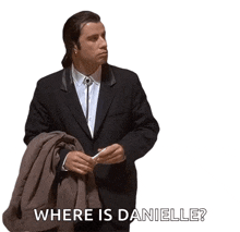 a man in a suit is holding a brown jacket and asking where is danielle