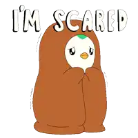a cartoon of a penguin wrapped in a brown blanket with the words " i 'm scared " below it