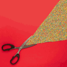 scissor cutting red