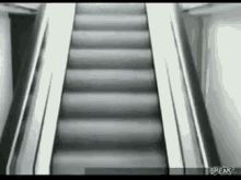 Escalator Tumble GIF