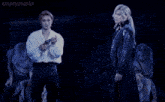 a blurry photo of two people with the words emptymasks on the bottom right
