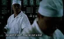 a man in a lab coat says so sort it out