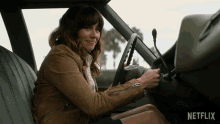 Hug Steering Wheel Judy Hale GIF - Hug Steering Wheel Judy Hale Linda Cardellini GIFs