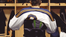 a man wearing a jersey with the number 8 on the back