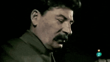 a close up of a man 's face with the number 2 on the bottom right corner