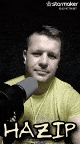 a man wearing headphones and a yellow shirt with the name hazip written on it