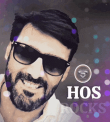a man with a beard wearing sunglasses and the word hos rocks on the bottom