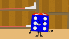 a blue dice with white dots on it 's face