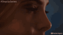 a close up of a person 's face with the words #stepupseries visible