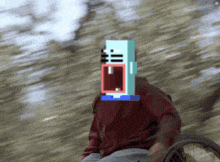 a person in a wheelchair with a pixelated face on their face