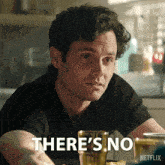 a man sitting at a table with a netflix logo on the bottom