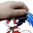 a hand is holding a cartoon character 's head with a blue fork .